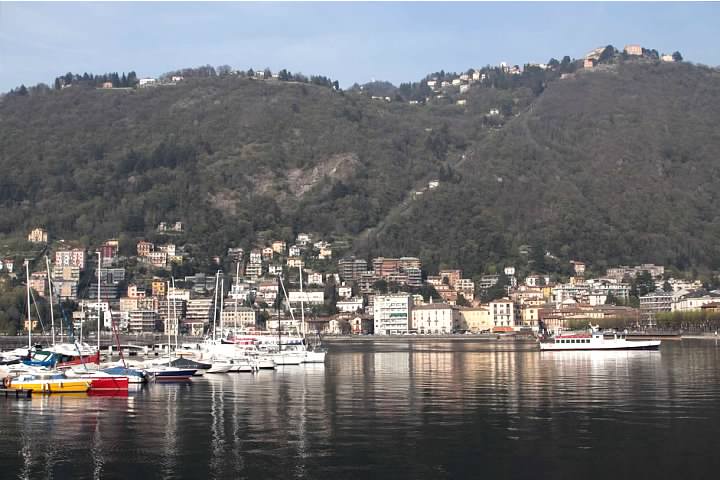 Como's harbor with Brunate on the hill above