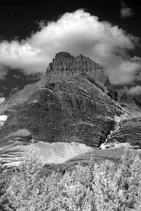 Mt. Wilbur in infrared seen from near where the connector trail from Swiftcurrent Motor Inn meets the main trail. Iceberg lake sits on the far side of the mountain. Lowell Silverman photography, 2014